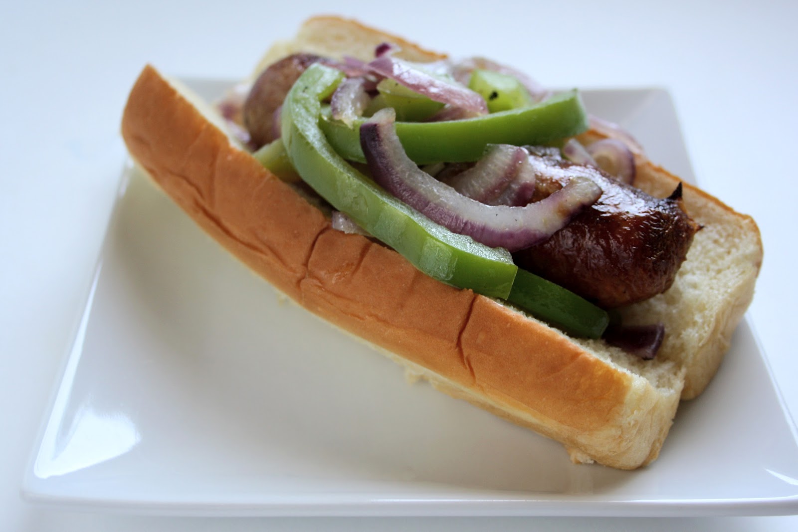 GRILLED ITALIAN SAUSAGES WITH PEPPERS Butter with a Side of Bread
