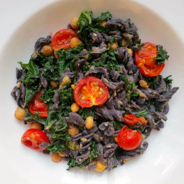 The Veracious Vegan Black Bean Pasta with Kale and Cherry Tomatoes