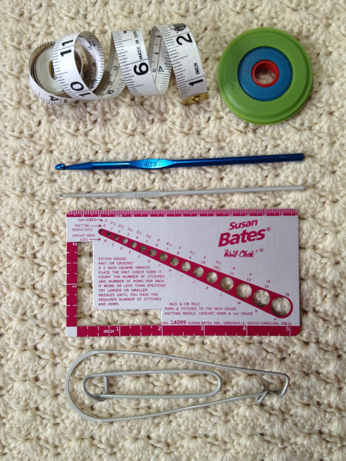 ... TAPE, POM POM MAKER, CROCHET HOOKS, NEEDLE GAUGE, STITCH HOLDERS