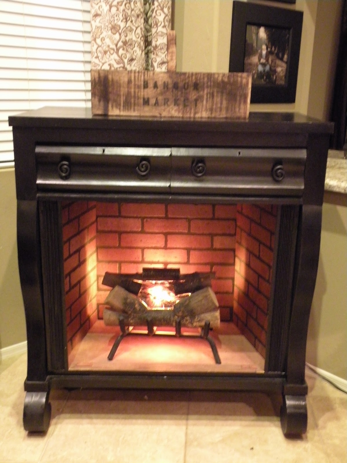 HOUSE UNDERCOVER Old Dresser Turned Fireplace
