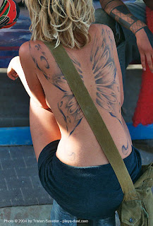 Tattooed Girl with Butterfly Wings Tattoo on Back