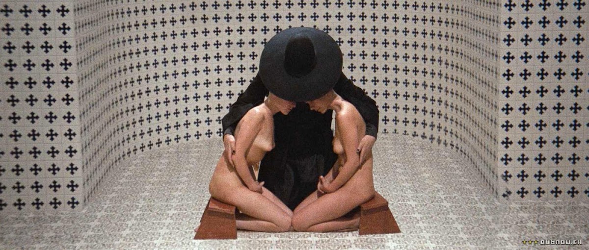 http://4.bp.blogspot.com/-JY-TNkRRhps/TkYgR_CluYI/AAAAAAAAAws/eQNkZQsbubo/s1200/holy-mountain4.jpeg