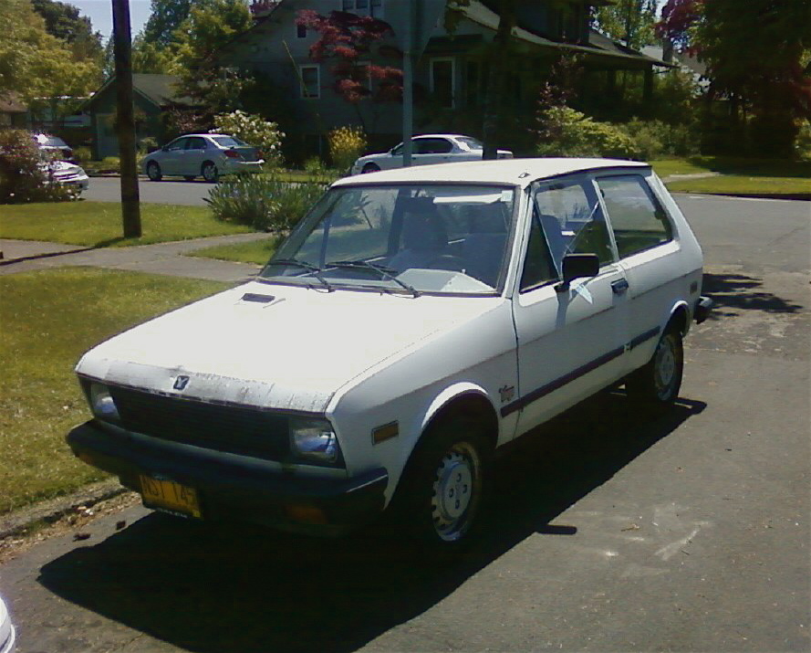OLD PARKED CARS. Corvallis Contribution 1992 Yugo EV Hatchback.