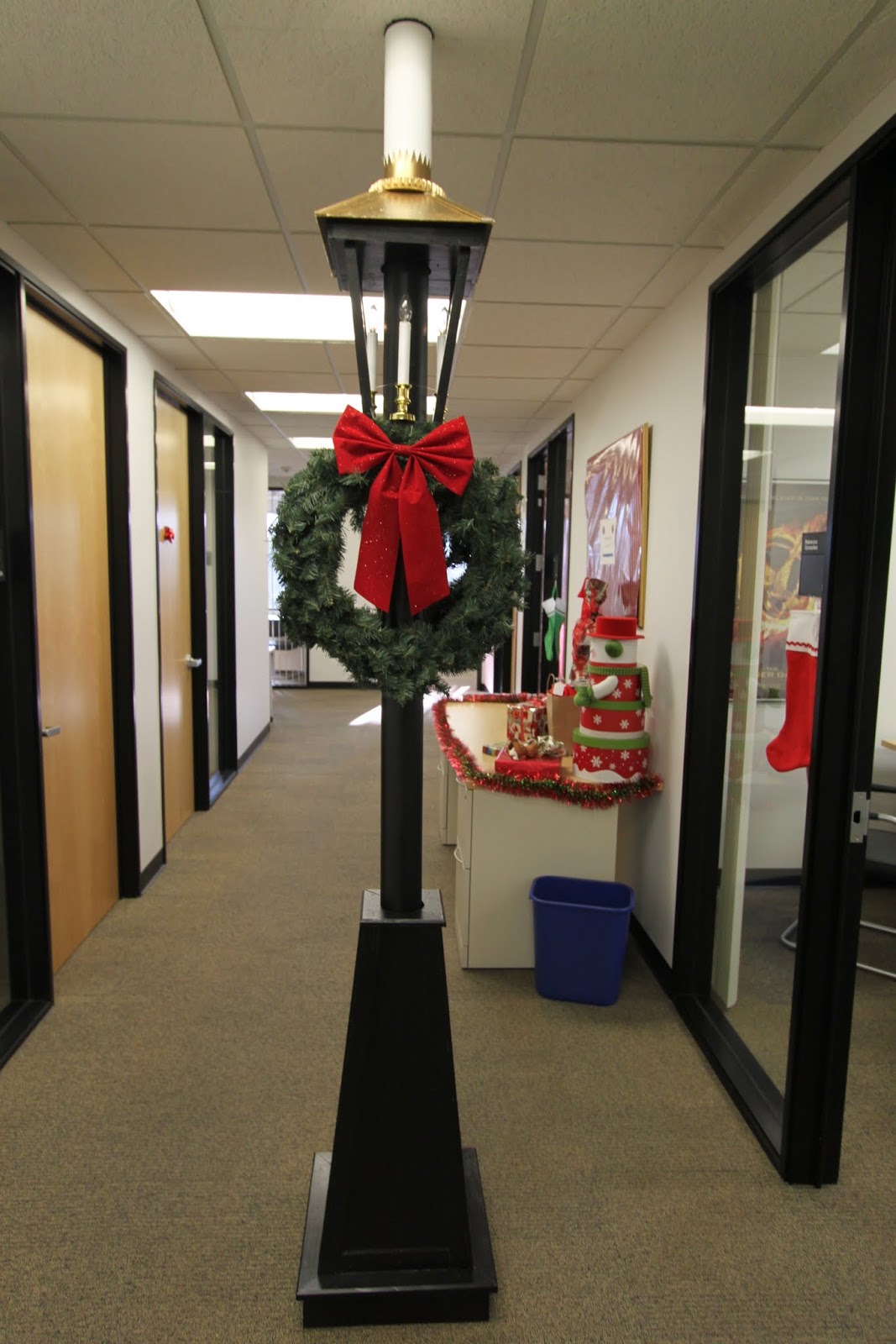 the office holiday pole decorating contest midcentury modern remodel