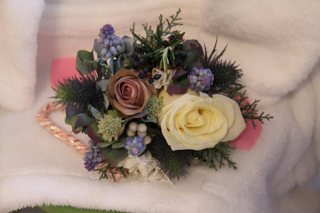 The Adult Bridesmaid's Bouquets were smaller versions of the Bridal Bouquet