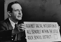 Arkansas Governor Orval Faubus 1957, refuses to desegregate Little Rock schools holding up sign Arkansas Governor Orval Faubus 1957, refuses to desegregate Little Rock schools holding up sign
