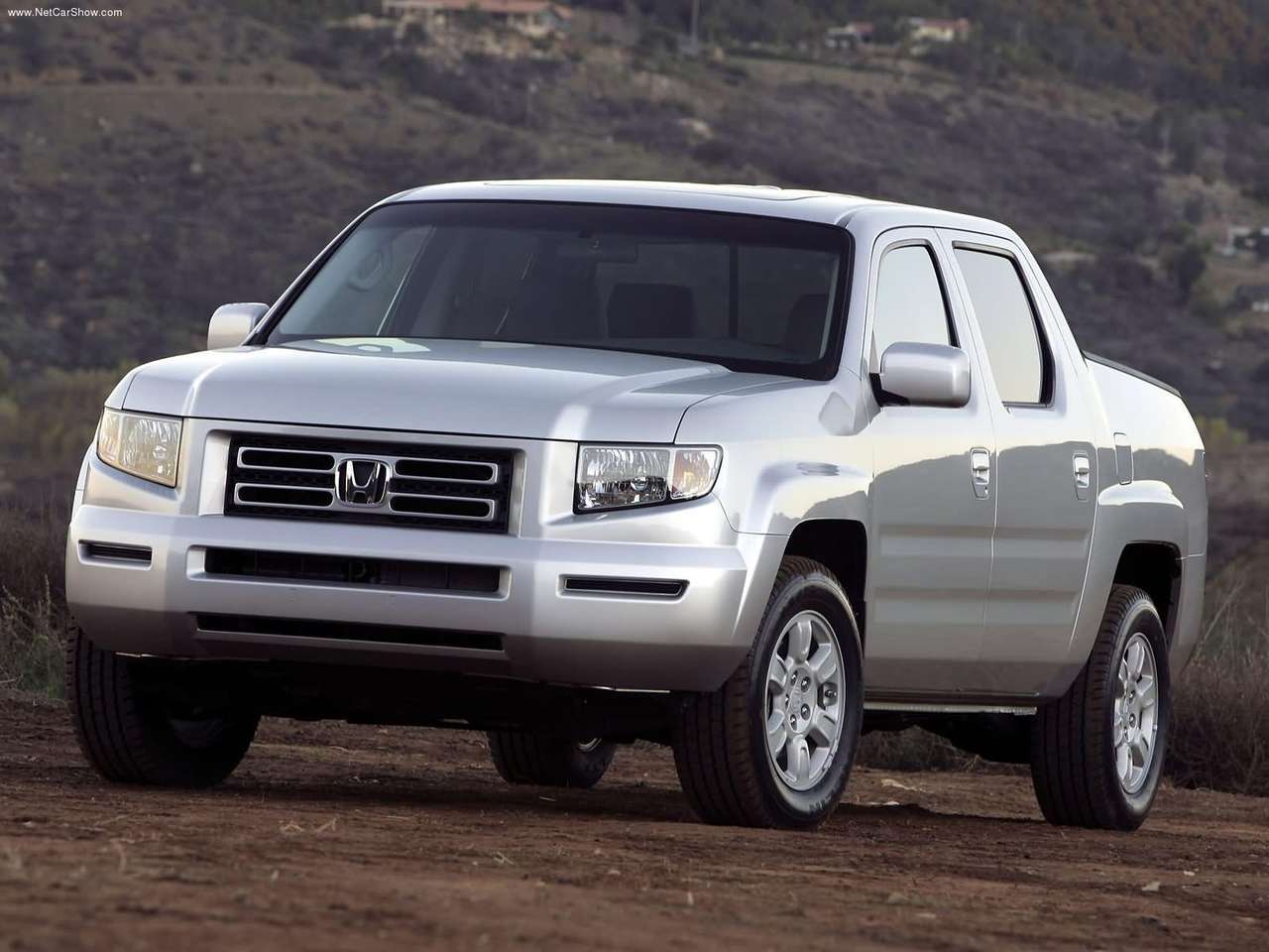 http://4.bp.blogspot.com/-JuhkMvCeCy0/TZl2NwBJk8I/AAAAAAAAFZQ/DMTDOMU7Xtg/s1600/Honda-Ridgeline_RTL_2006_1280x960_wallpaper_03.jpg