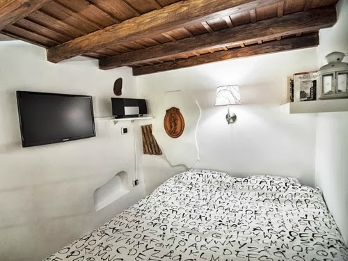 11-Bedroom-With-Some-Mod-Coms-Smallest-House-in-Italy-75-sq-Feet-7-m2-Italian-Architect-Marco-Pierazzi-www-designstack-co