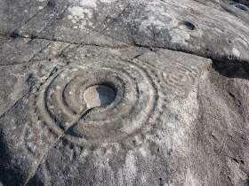 Петроглифы Laxe das Rodas, Лоуро, Галисия, Испания. Кольца на камне, доисторическое искусство.