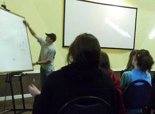 One of our therapists instructs the group Therapist_instructs_students_during_workshop_Cedar_Ridge_Private_International_Therapeutic_Boarding_School