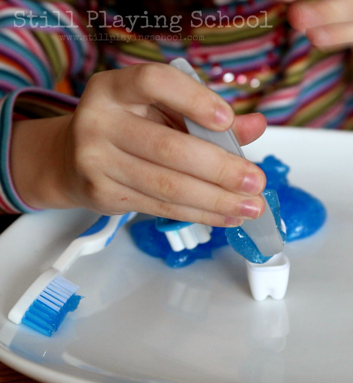 Toothpaste Slime for Dental Health Month Still Playing School