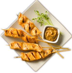 THAI TRADITIONAL CHICKEN SATAY WITH PEANUT SAUCE AND SPROUTS LEAVES