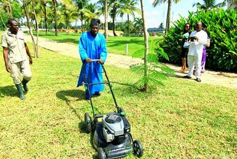 BABA MOWING GRASS