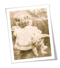 Author as a child with favourite teddy