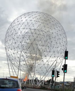 Monarch Street bonfire burning behind RISE sculpture