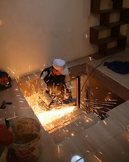 Grinding down the excess steel Grinding down the excess steel