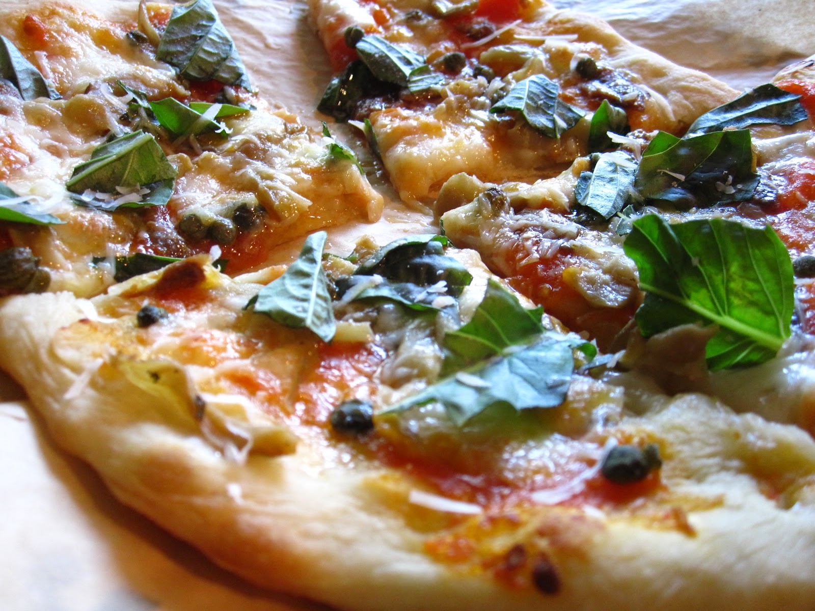 Edible biology Anchovy, caper and marinated eggplant pizza