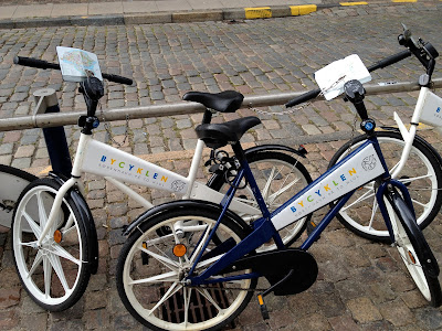 Copenhagen bike share bikes locked together with personal lock inaccessible bike share bikes locked together
