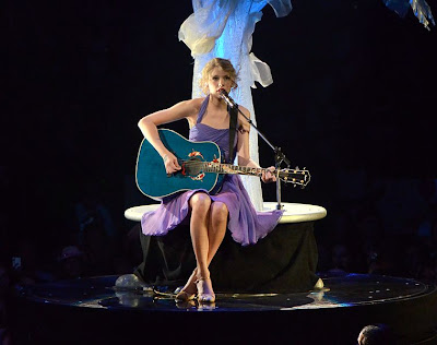 Taylor Swift singing a song