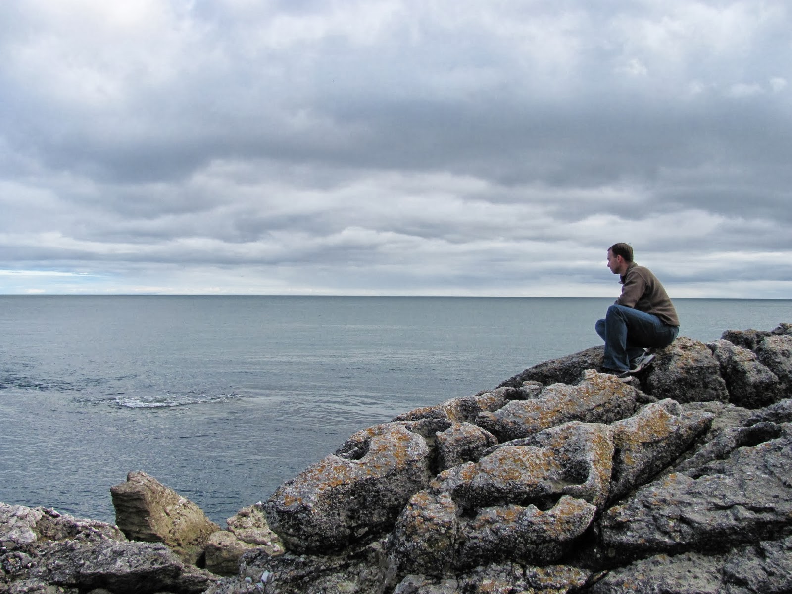 Cory Looks at the Sea Cory climbs the rocks and looks at the sea