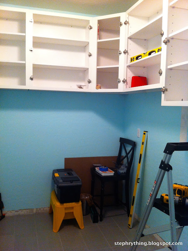 The cabinets shipped a few weeks later and Brent went straight to work title=