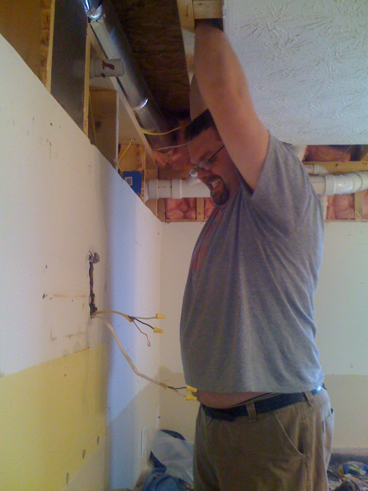 How to cut crown molding for kitchen cabinets Day Four: Hang the new upper cabinets. Make cut outs where needed to