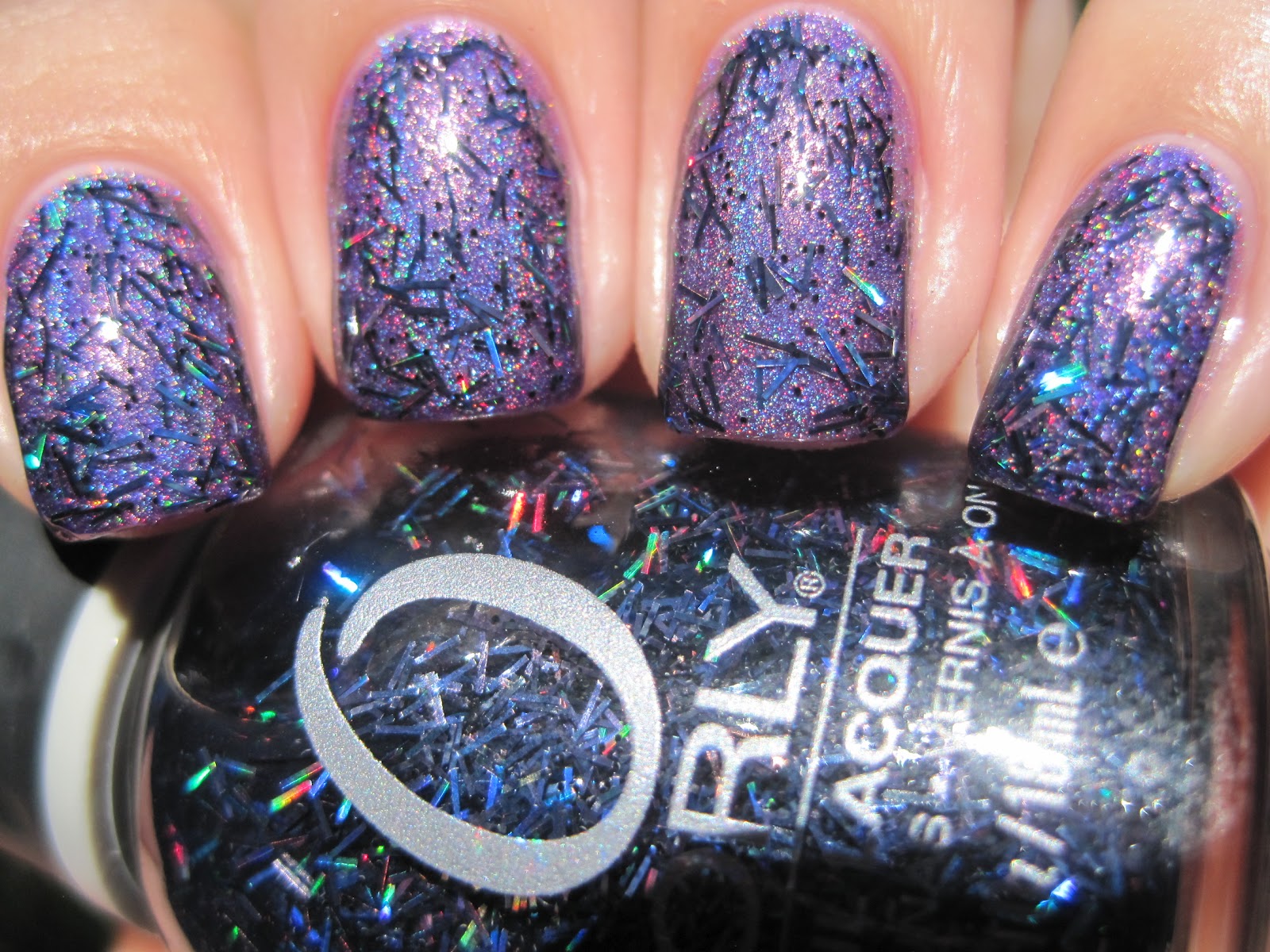Sparkly Vernis Orly Sunglasses At Night is one of the strangest nail