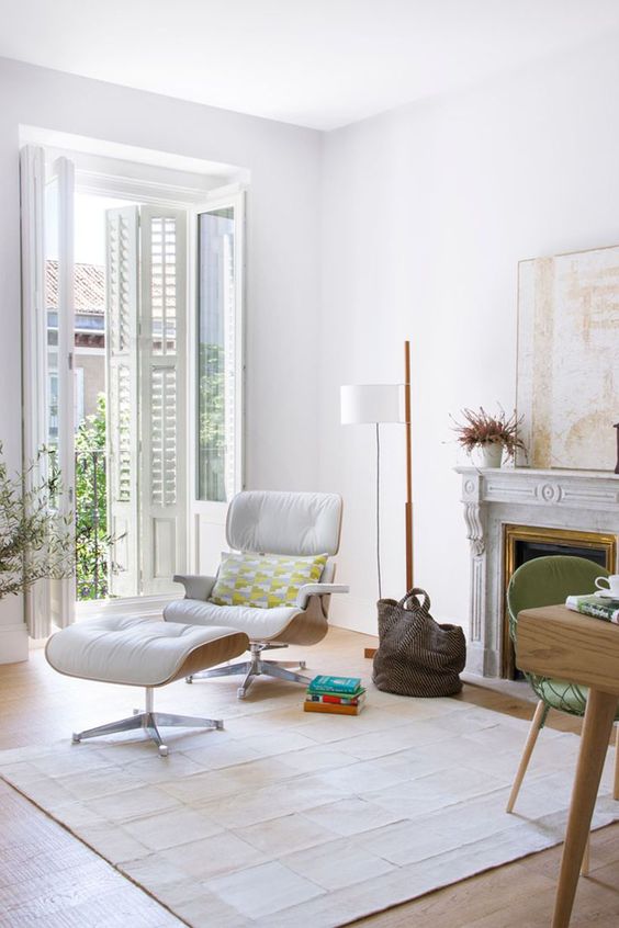 The Peak of Très Chic Admiring a Classic The Eames Lounge Chair