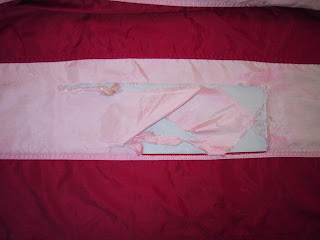 tear in flag from the world trade center, art conservator, museum display, September 11