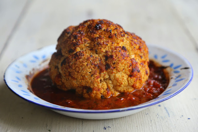 slow roasted head of cauliflower in tomato chipotle sauce (vegan, gluten-free)