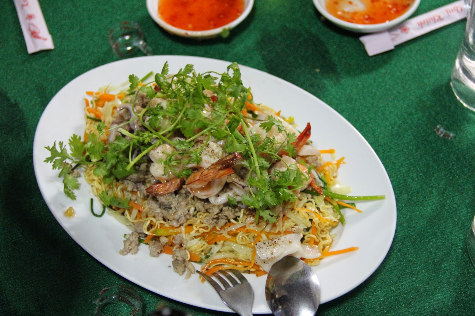 Delicious seafood and noodles dish for dinner at a private home in Chau Doc, Vietnam. Delicious seafood and noodles dish for dinner at a private home in Chau Doc, Vietnam.