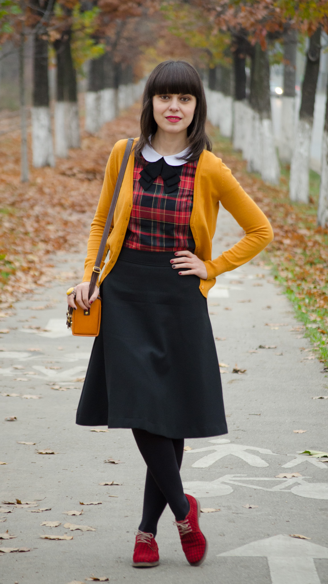 houndstooth oxfrod shoes mustard sweater tartan shirt peter pan collar black a-line skirt fall leaves school outfit bow