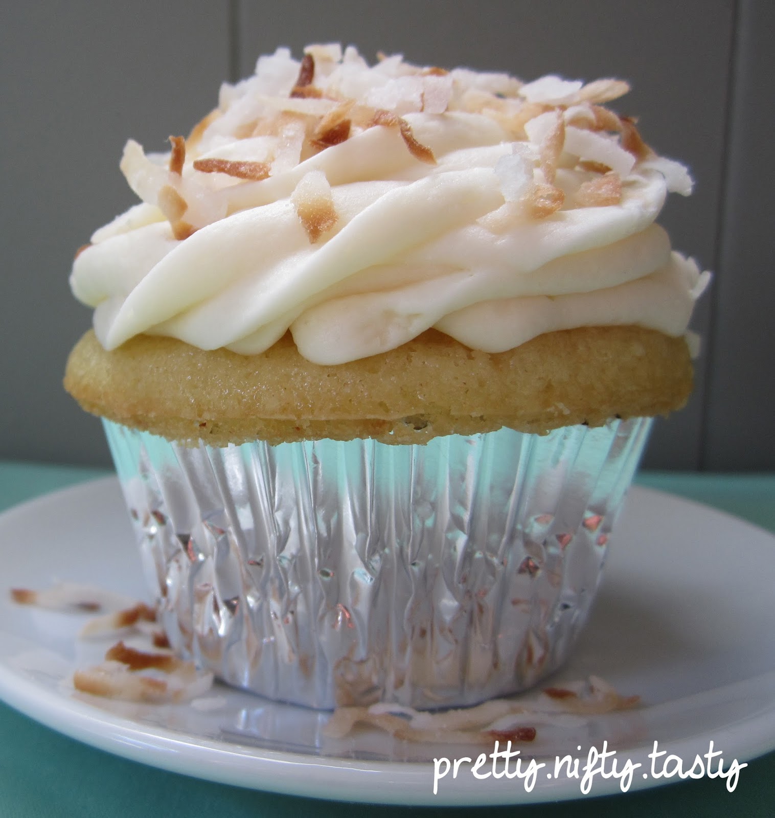 Pretty.Nifty.Tasty Toasted Coconut Rum Cupcakes