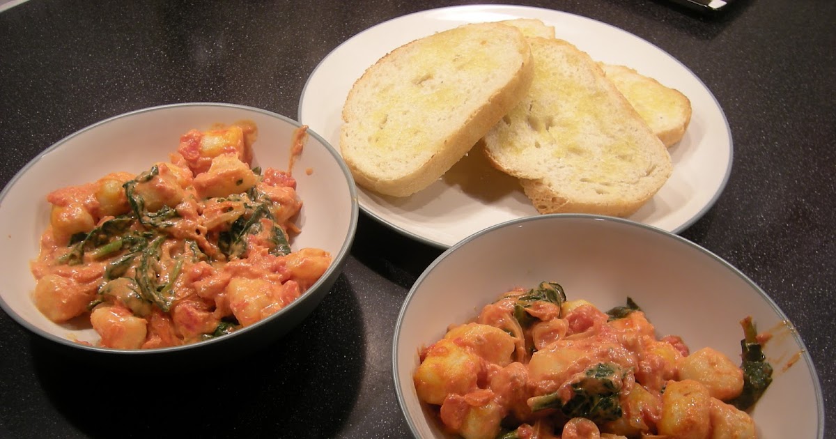 The Zippicurean Gnocchi Baked with Spinach in Goat CheeseTomato Cream