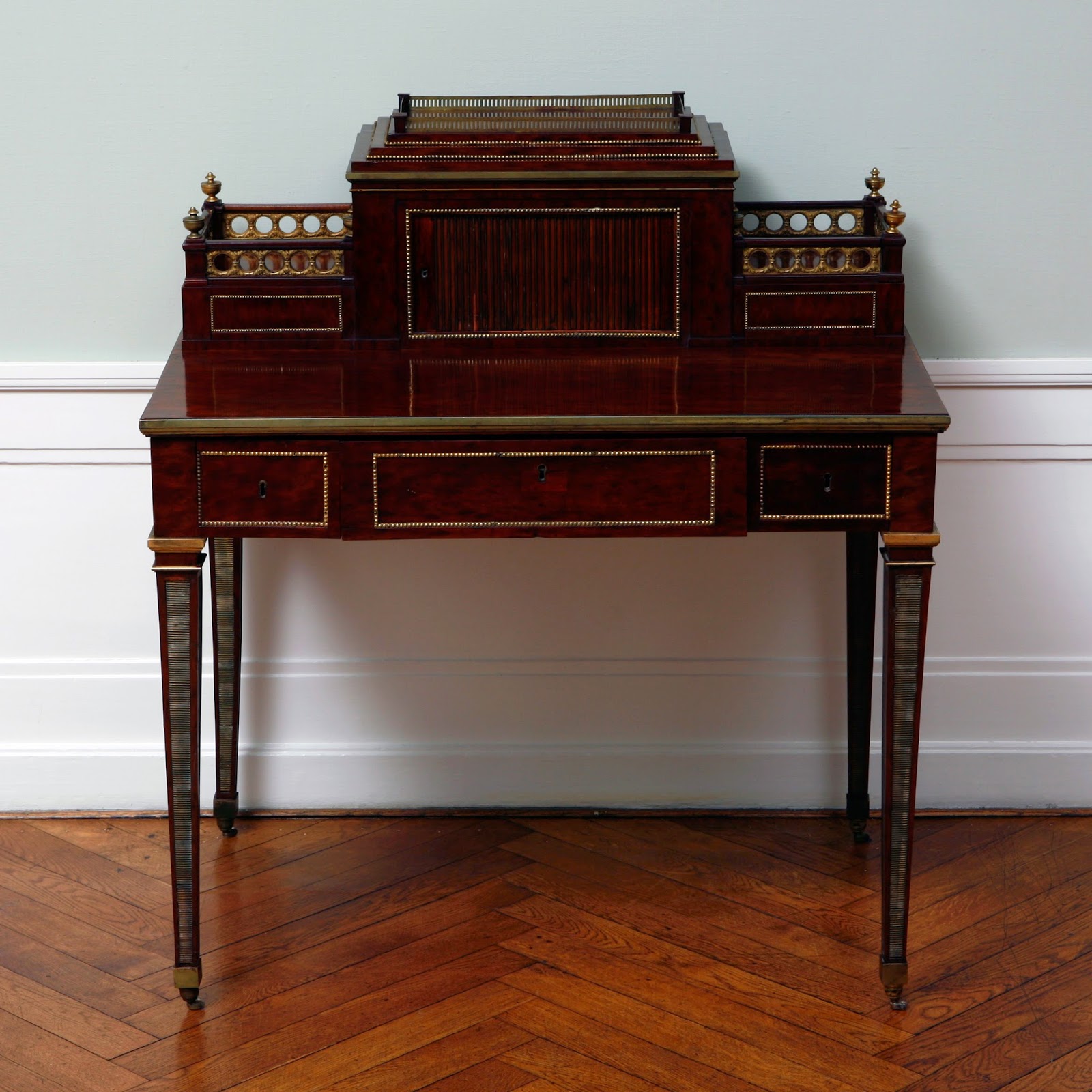 Ladies desk; oak veneered with mahogany, with gilded bronze and brass David Roentgen, Germany, 1780-1790