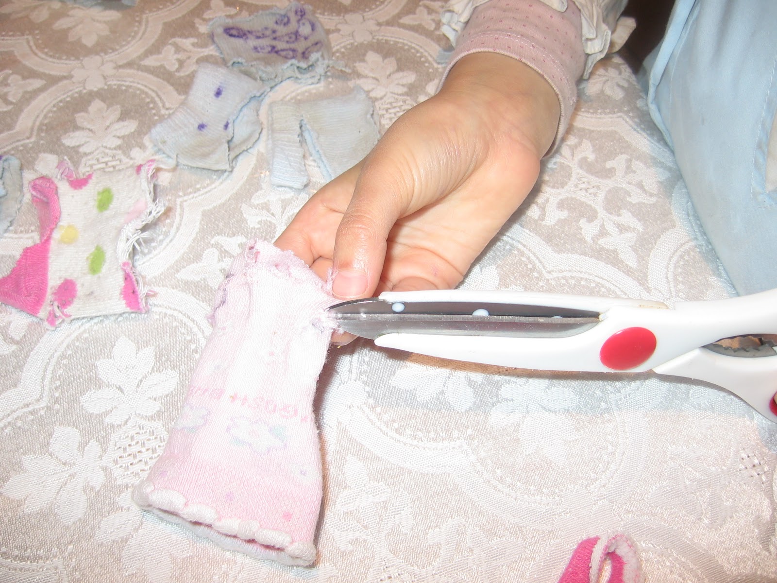 Little Homemakers in Training How To Make Dolls Clothes From Mismatched Socks