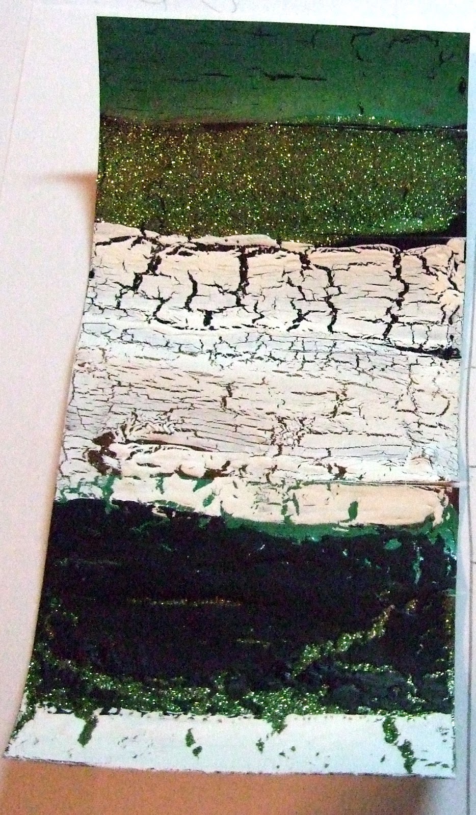 UpToMyNeckInPaper Elmer's glue as a crackle medium.