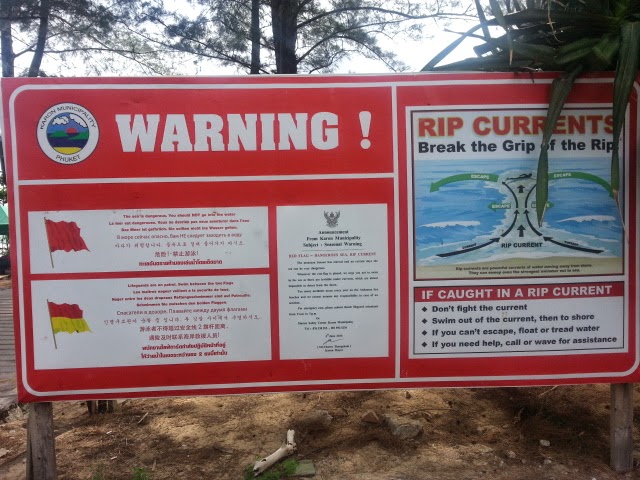 Sign warning swimmers at Karon Beach - Phuket Sign warning swimmers at Karon Beach - Phuket