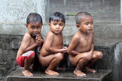 Kids in the Rain. Lombok island.