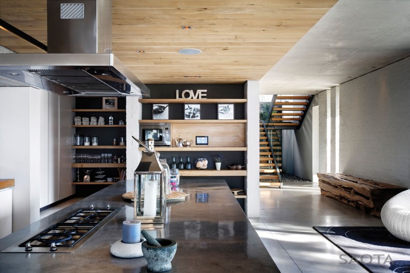 Photo of beautiful modern kitchen interiors as seen from the kitchen island