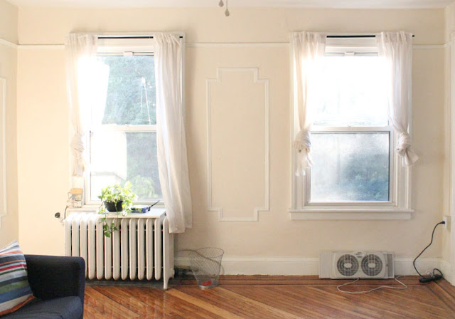 living room in our empty brooklyn apartment in fort greene, new york