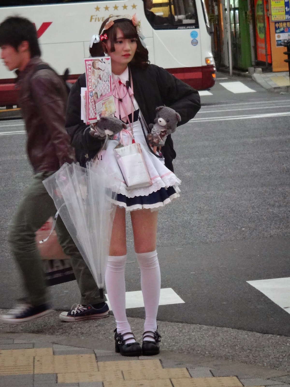 Pretty maids promote maid cafes at Akihabara in Tokyo, Japan Pretty maids promote maid cafes at Akihabara in Tokyo, Japan