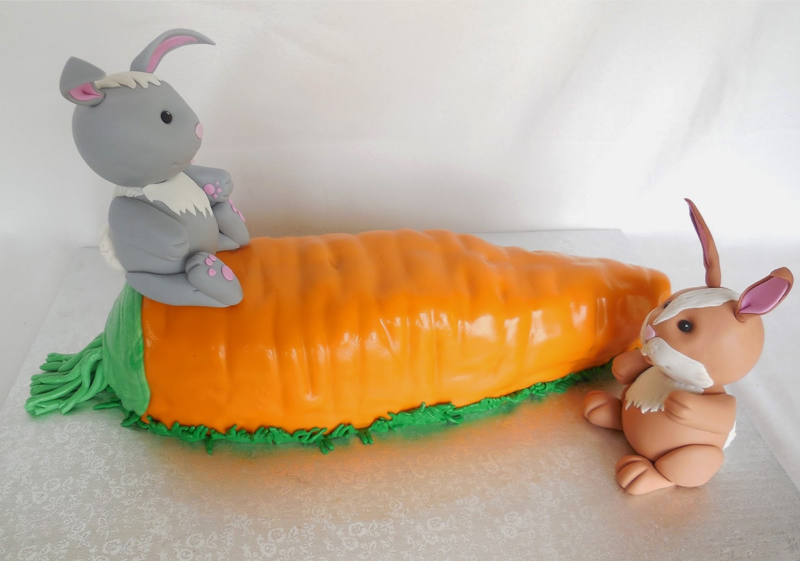 Custom Cakes by Lori Giant carrot cake with sugar paste bunnies