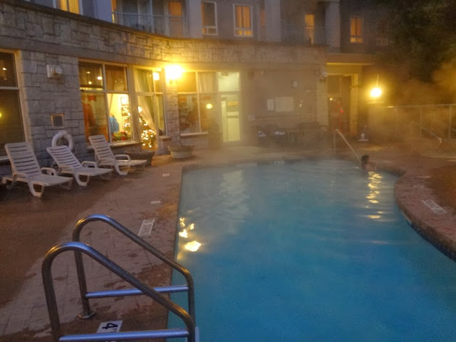 Outdoor heated pool and hot tub at Summit Lodge & Spa in Whistler Village