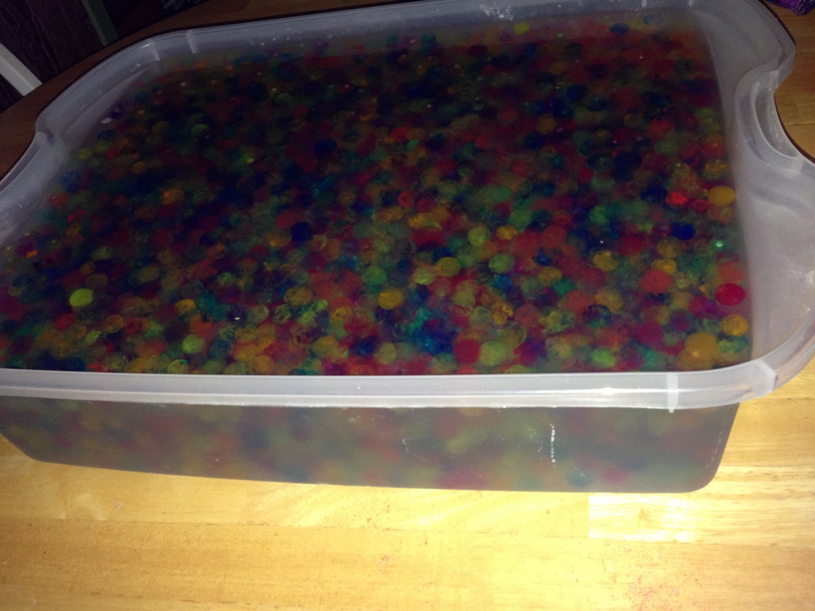 Swimming with water beads Homeschool and Light Tables