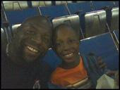 Dr. Beckles with one of his Sons; Chris Beckles