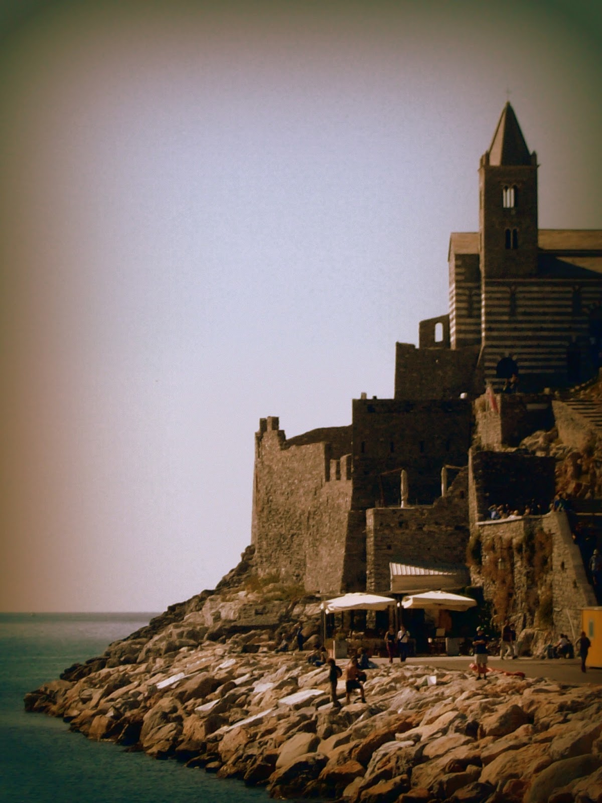 Italy, Liguria, Italian flag in front of Palmaria Island stock photo