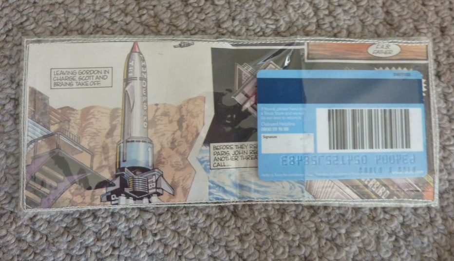 Jovial Spondoodles Sewing with laminated paper, and vinyl wallets from