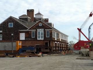 Overall view of the Bay Head Yacht Club building, raised above ground.