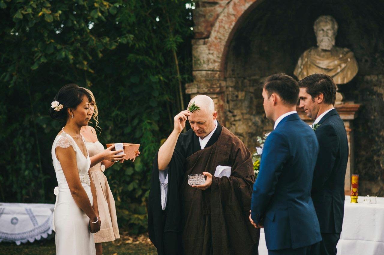 Being blessed by the master of ceremony A wedding in Tuscany